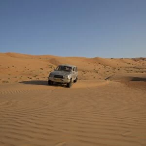 Four wheel drive on desert dunes, Wahiba, Oman, Middle East