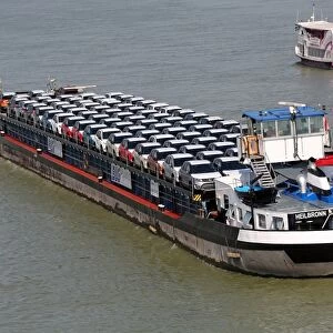 Cargo ship transporting motor cars on the River Danube, Budapest, Hungary
