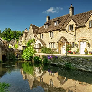 Cottages Reflecting in By Brook, Castle Combe, Wiltshire, England