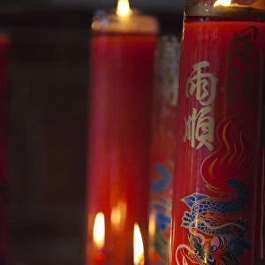 Taiwan, Taipei, Candles burning at Bao-an Temple