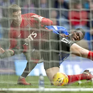 Rangers vs Kilmarnock: Intense Battle between Lassana Coulibaly and Stuart Findlay at Ibrox Stadium