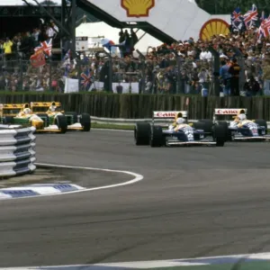 1992 British Grand Prix, Silverstone. Patrese leads Mansell in their Williams FW14B into Copse 1992 British Grand Prix, Silverstone. Patrese leads Mansell in their Williams FW14B into Copse
