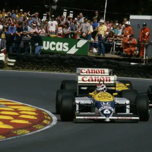 Williams FW11 Ricardo Patrese leads Nigel Mansell. 1986 British Grand Prix Williams FW11 Ricardo Patrese leads Nigel Mansell. 1986 British Grand Prix