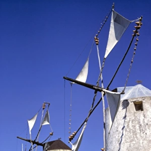 Europe, Portugal, Leiria. Windmill sails glides quietly in the breeze in the Leiria