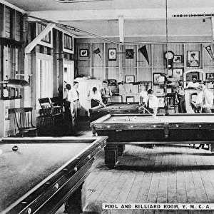 The pool and billiard room at the Gatun Y. M. C. A. in the Panama Canal Zone, built for American civilian workers. Photograph by Thomas J. Marine, c1910