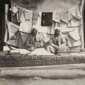 SAMARKAND: VENDOR, c1870. A vendor of shirts and other clothes at a bazaar in the