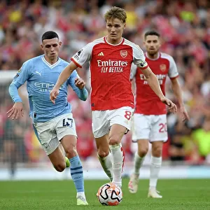 Arsenal's Odegaard Faces Off Against Manchester City's Foden in Premier League Showdown (2023-24)
