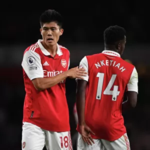 Arsenal's Tomiyasu and Nketiah in Action against Aston Villa, 2022-23 Premier League
