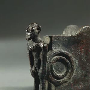 Detail of male figure carving of bronze sword scabbard, from necropolis of Mandrione di Cavalupo, province of Viterbo