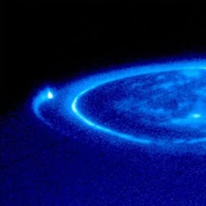 NASA Hubble Space Telescope close-up view of an electric-blue aurora that is eerily