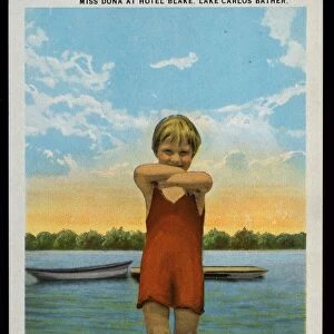 Postcard of Young Bather at Lake Carlos. ca. 1924, Young Miss Dona, with arms folded, stands wearing a bathing suit on a dock at the Hotel Blake on Lake Carlos