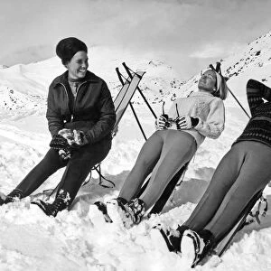 Skiers Basking In The Sun