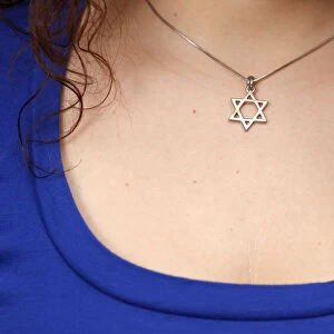 Young woman with a star of David necklace