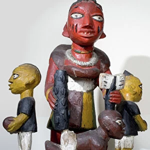 Carved figures, Yoruba Culture, South Nigeria (painted wood)