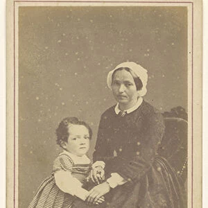 woman seated little girl standing next Gabriel Blaise