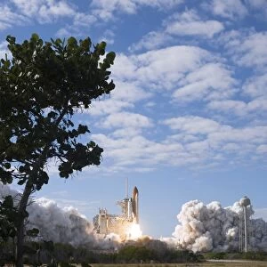 Space Shuttle Atlantis lifts off from its launch pad at Kennedy Space Center, Florida