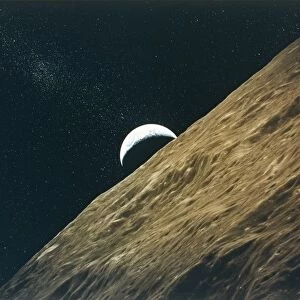 Earth rising above the Moon, seen from Apollo 15, July-August 1971. Creator: NASA