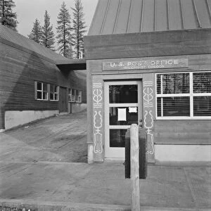 Post office in company lumber town, Gilchrist, Oregon, 1939. Creator: Dorothea Lange