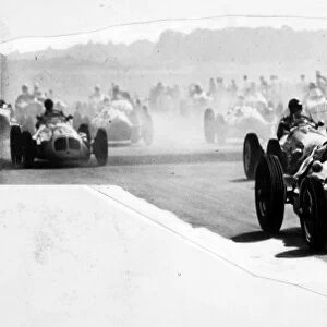 1948 British Grand Prix: Emmanuel de Graffenried leads Louis Chiron and Bob Gerard at the start. Gerard finished in 3rd position