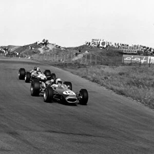 1966 Dutch Grand Prix: Jack Brabham, Brabham BT19-Repco, 1st position, leads Jim Clark, Lotus 33-Climax, 3rd position, action