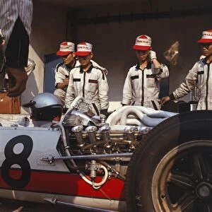 1966 Italian Grand Prix - Richie Ginther: Richie Ginther is discussed by the mechanics
