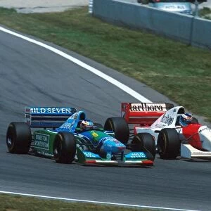 Formula One World Championship: Mika Hakkinen Mclaren MP4-9, right dives inside Michael Schumacher Benetton B194