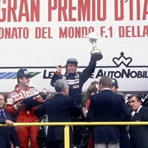 Monza, Italy. 12 September 1982: Rene Arnoux, Renault RE30B, 1st position, Patrick Tambay, Ferrari 126C2, 2nd position, and Mario Andretti, Ferrari 126C2