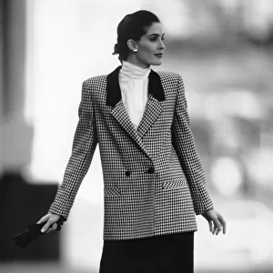 1980s Women,s Fashion: Our model wears Check double breasted jacket with black skirt