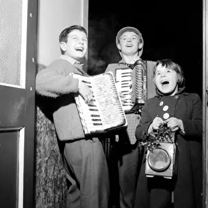 Three Carol singers from Canton, Cardiff, who tour the neighbourhood at Christmas time