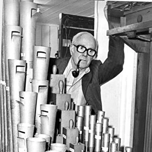 George Blake of the Cleveland Organ Society with the trumpet pipes of the Wurlitzer organ