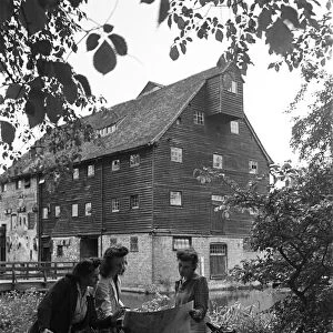 Members of the Youth Hostel Association at Houghton Mill in Houghton, Cambridgeshire