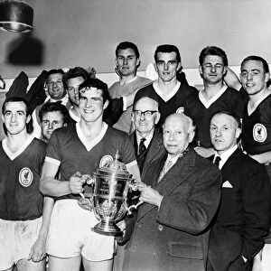 Mr Joe Richards, president of the Football League, poses with Liverpool captain Ron Yeats