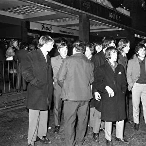 New Year revellers chat with the police outside the Hotel Leofric. 31st December 1971