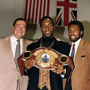 Nigel Benn Boxer with Manager Ambrose Mendy and American Promoter Bob Arun