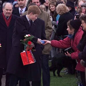 Prince Harry Sandringham Estate Christmas Day 1999 Prince Harry accepts a gift