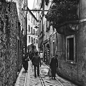 View of a street with people, Zara