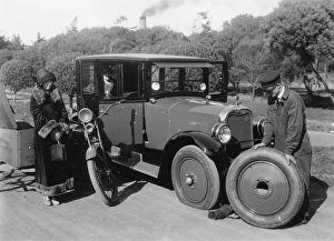 Latest Image Prints: 1925 Cleveland 6 having wheel changed after puncture