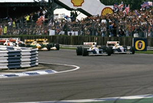 1992 British Grand Prix, Silverstone. Patrese leads Mansell in their Williams FW14B into Copse 1992 British Grand Prix, Silverstone. Patrese leads Mansell in their Williams FW14B into Copse