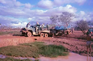Bluebird CN7 being transported through the Bush