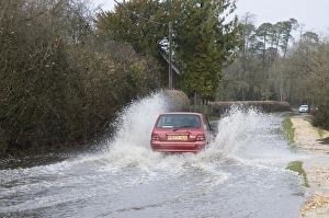 Driving Prints: Car driving through flood
