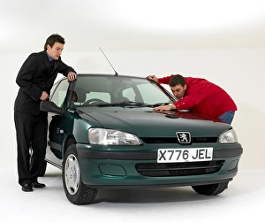 Car salesman with customer