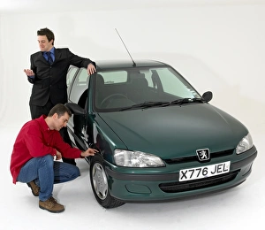 Car salesman with customer