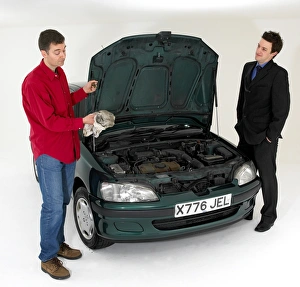 Car salesman with customer