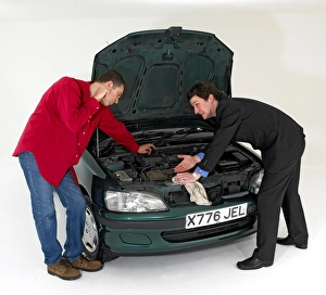 Car salesman with customer