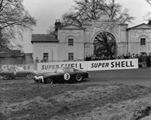 Ferrari 250 SWB spins as Jaguar E type passes
