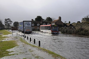 Lorry driving on flooded road