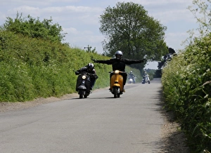 Motor Bike Prints: High Spirited scooter riders on a run