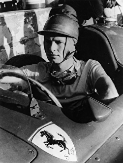 Trending: Racing driver Peter Collins in Ferrari cockpit