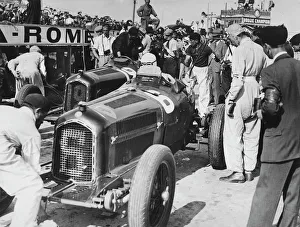 Scuderia Ferrari Alfa Romeos at Montlhery 1934. Car 6 is Varzis car and 12 is Chirons winning car Scuderia Ferrari Alfa Romeos at Montlhery 1934. Car 6 is Varzis car and 12 is Chirons winning car