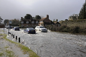 Car driving through flood